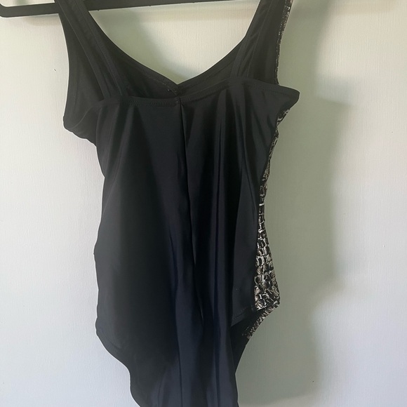 Black and leopard one piece swimsuit. Cross tie sash.  Worn once. Fits like a 6 - Picture 5 of 7